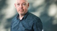 Famed Irish writer John Boyne, 54, has said his literary peers have tried to 'cancel' him over his views on transgender issues - but book sales have only gone up