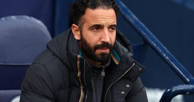 Manchester United boss Ruben Amorim looks on in despair during his side's humiliating 3-0 loss to Manchester City