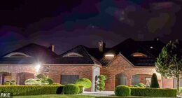 The Daily Mail can reveal Piotr Szczerek lives in a luxurious modern villa in a small upmarket enclave in a historical village in Poland, with his wife Anne and their two sons aged 10 and 12