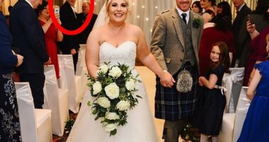 The wedding crasher is found: For four years this bride and groom pondered the identity of the dark-haired stranger at their nuptials - now they have discovered the hilarious truth