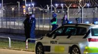 Police officers seen at Copenhagen Airport after all flights were diverted due to drone sightings