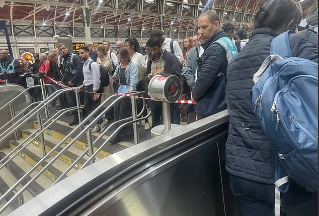 Photos show the entrance to the Tube at Paddington being cordoned off by staff
