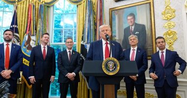 President Trump is pictured alongside, from left, Vice-President JD Vance, HHS secretary senior advisor Chris Klomp, Pfizer chief executive Albert Bourla, CMS administrator Dr Mehmet Oz and FDA commissioner Dr Marty Makary