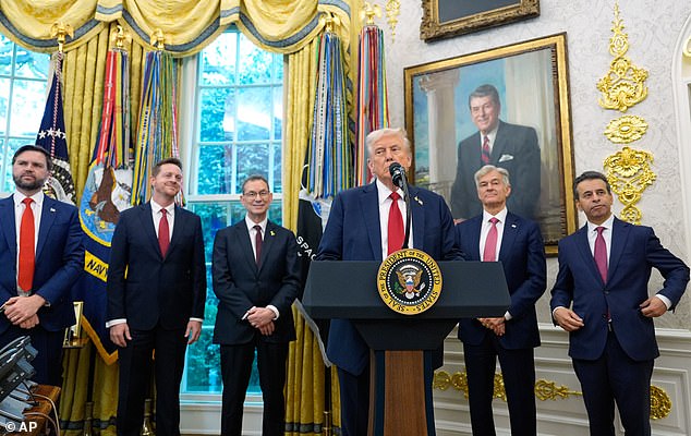 President Trump is pictured alongside, from left, Vice-President JD Vance, HHS secretary senior advisor Chris Klomp, Pfizer chief executive Albert Bourla, CMS administrator Dr Mehmet Oz and FDA commissioner Dr Marty Makary