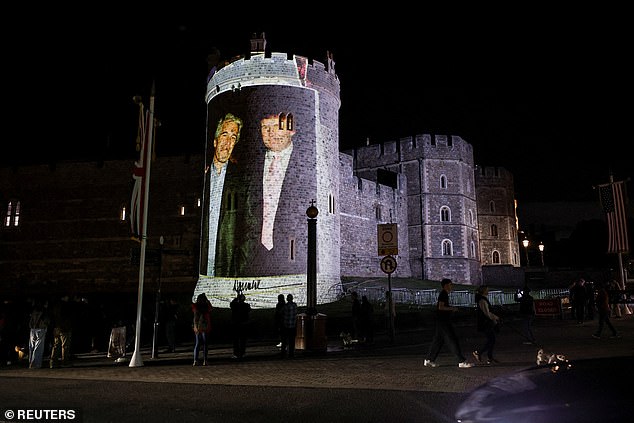 An image of U.S. President Donald Trump alongside disgraced financier Jeffrey Epstein is projected by by the campaign group Led By Donkeys on Windsor castle, after the arrival of U.S. President Donald Trump and first lady Melania Trump for a state visit to the country, in Windsor, Berkshire, Britain September 16, 2025