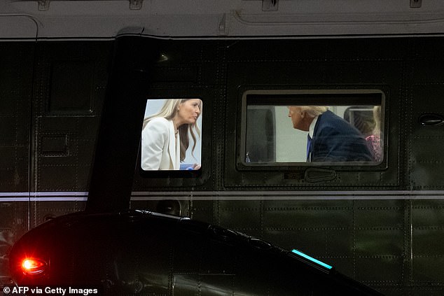 Donald and Melania Trump were caught having an awkward conversation on Marine One with the president seen waving a finger at his wife and the first lady shaking her head