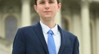 Two 17-year-old boys have been charged with the murder of Eric Tarpinian-Jachym, 21, a young Congressional staffer who was gunned down just a mile from the White House