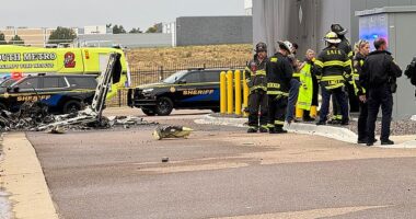 Two people were killed when a plane crashed into a a Colorado business park and ignited a fire early Friday morning