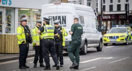 Two women in their 70s are fighting for their lives after being hit by a reversing Ford Transit van in Lowbourne in Melksham, Wiltshire (pictured: police at the scene on Saturday)