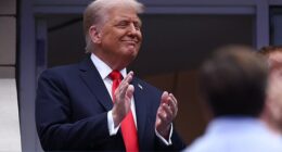 Donald Trump was greeted with cheers and boos when he arrived at the US Open final Sunday
