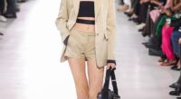 Naomi Watts' model daughter Kai Schreiber, 16, suffered a wardrobe malfunction while walking the runway this week