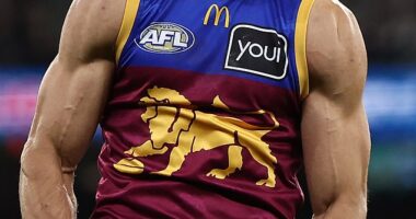 Footy fans are up in arms after confirmation music will be blared across the MCG when players boot goals in the Grand Final (pictured, Brisbane Lions star Charlie Cameron)