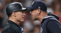 New York Yankees manager Aaron Boone argues with umpire after Devin Williams’ ejection during eighth-inning collapse against the Houston Astros.