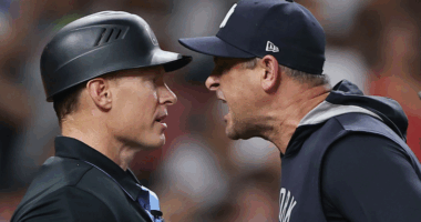 New York Yankees manager Aaron Boone argues with umpire after Devin Williams’ ejection during eighth-inning collapse against the Houston Astros.