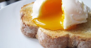 According to chef Paul Foster, poaching eggs without vinegar is the 'better' way to do it, and tastes better (stock image)