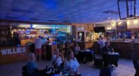 A deadly mass shooting took place around 1am Sunday at Willie's Bar and Grill in St. Helena Island, South Carolina (Pictured: Undated photo of the restaurant's interior)