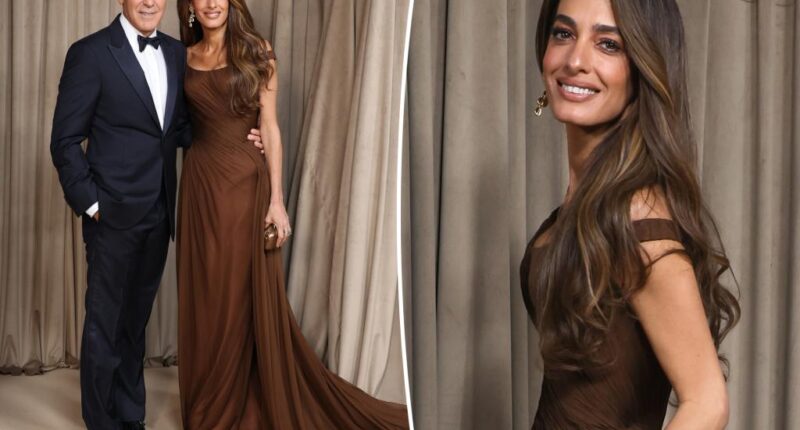 Amal Clooney wears a brown Versace dress for Albie Awards with George Clooney