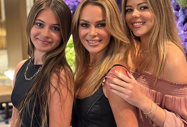 Amanda Holden has revealed her youngest daughter Hollie (L) goes out of her way to avoid being seen with her - insisting the teenager wants 'no connection' with her famous mum