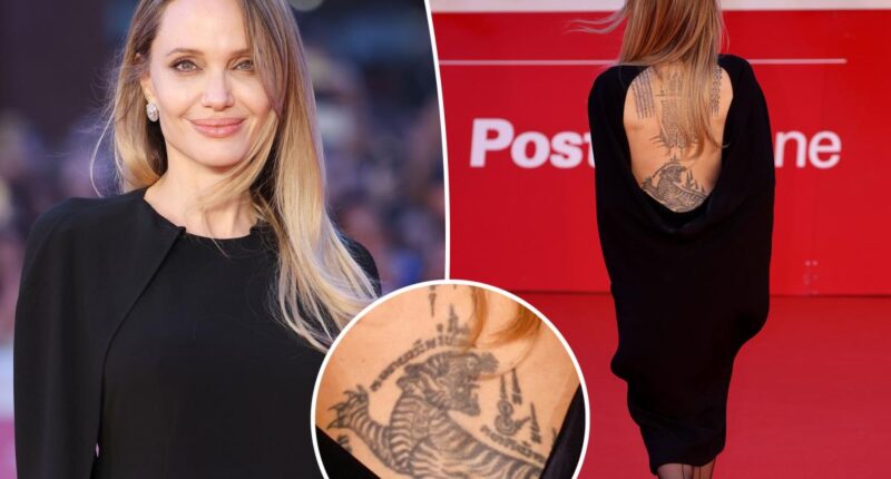 Angelina Jolie flaunts back tattoos backless dress at 'Couture' Rome premiere