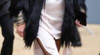 Kate Moss, 51, is a fan of sheer Parisian-style stockings and is pictured wearing them with her ensemble outside Dior Homme, during the Paris Fashion week in January
