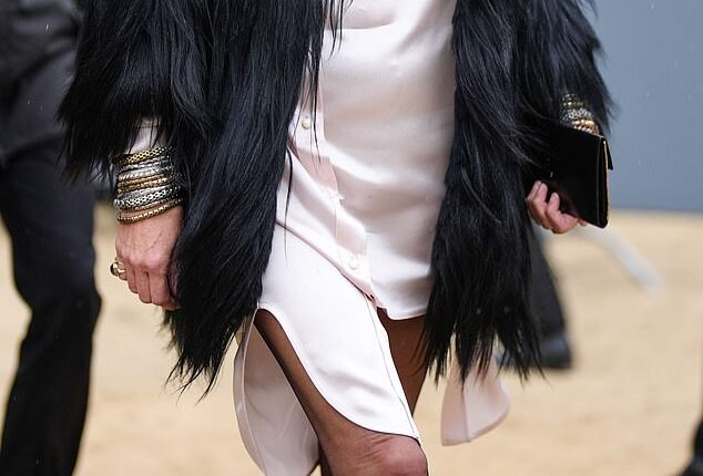 Kate Moss, 51, is a fan of sheer Parisian-style stockings and is pictured wearing them with her ensemble outside Dior Homme, during the Paris Fashion week in January