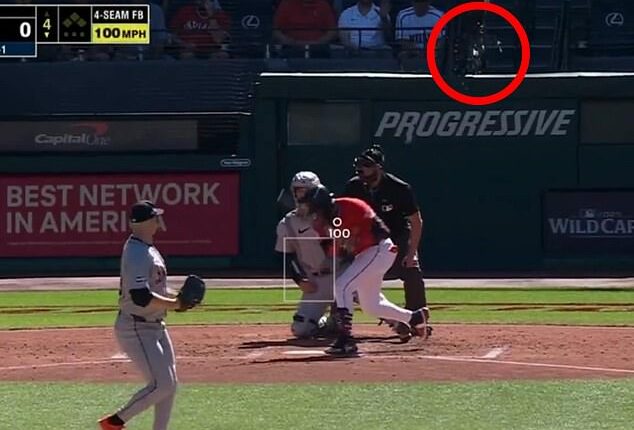 A pitch fouled backwards by a Guardians player shattered the glass on a camera lens Tuesday