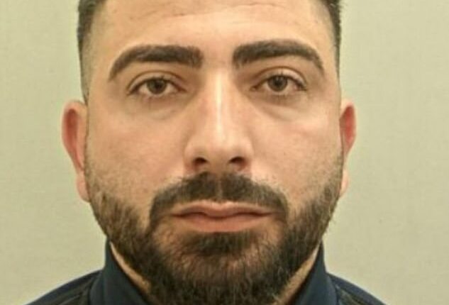 Anjan Ahmadi (pictured) was allowed to stay in the UK by the Home Office before helping two migrants illegally enter the country