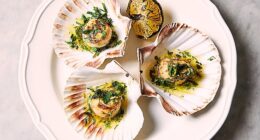 Scallops are ‘beautifully cooked and drenched in garlic butter’