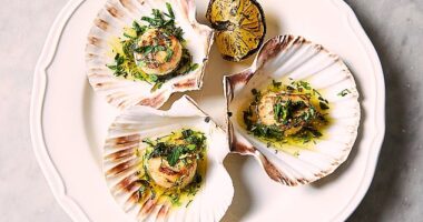 Scallops are ‘beautifully cooked and drenched in garlic butter’