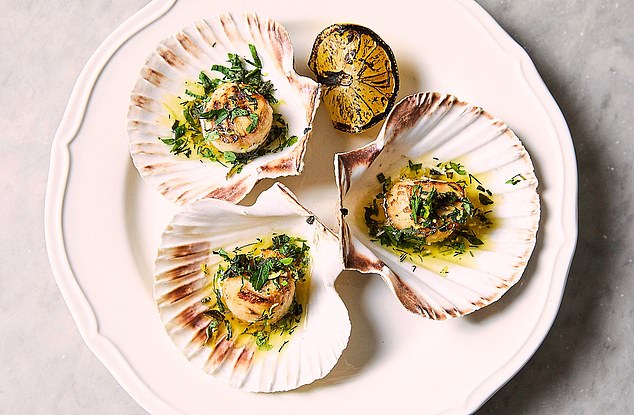 Scallops are ‘beautifully cooked and drenched in garlic butter’