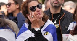 People attend an event organised by the Board of Deputies of British Jews in London's Trafalgar Square, to mark the anniversary of the October 7 attacks in Israel