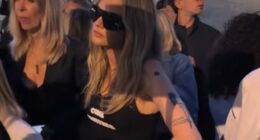 Cara Delevingne looked less than impressed as she was forced to wait in line before entering the Stella McCartney show during Paris Fashion Week on Tuesday
