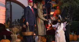 The FBI says it thwarted a potential terrorist attack this weekend as millions prepare for Halloween festivities. Pictured: Donald Trump and first lady Melania welcome trick-or-treaters to the White House on October 30, 2025