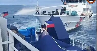 Chinese coast guard fires water cannon and rams Philippine vessel in disputed South China Sea