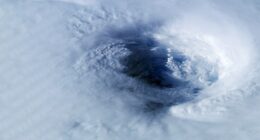 The hole in Earth's ozone layer is seen from space by NASA cameras. Scientists now believe closing this hole could increase levels of global warming (Stock Image)