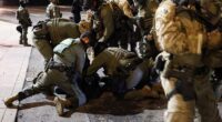 Conservative influencer Nick Sortor has been arrested after allegedly getting into a fight outside an Immigration and Customs Enforcement (ICE) facility. An image of a separate clash at the Portland ICE facility on Thursday night is pictured