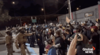 Antifa protesters push against police during a demonstration in Portland.