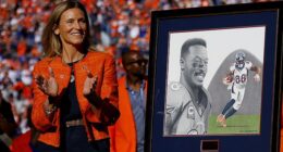 Broncos owner Carrie Walton Penner clap during Demaryius Thomas' posthumous induction