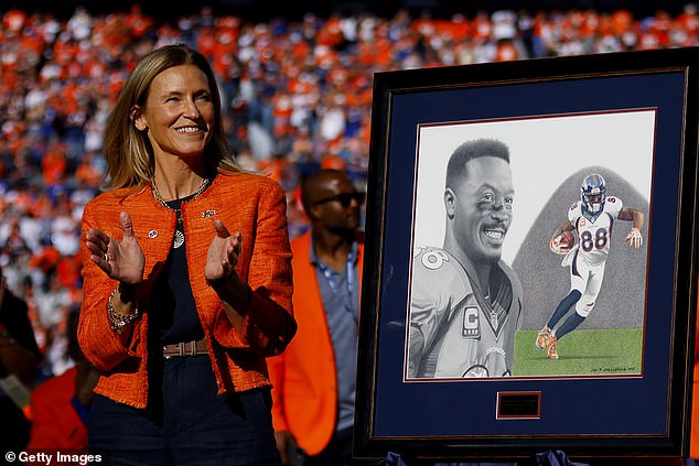 Broncos owner Carrie Walton Penner clap during Demaryius Thomas' posthumous induction