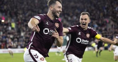 Defender Craig Halkett celebrates his late derby winner with Lawrence Shankland