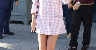 Emma Watson looked carefree as she stepped out at a Paris Fashion Week event days after being branded 'ignorant of how ignorant she is'