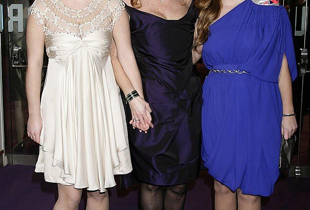 Emails from Jeffrey Epstein reveal Fergie was so desperate to cosy up to him that 'she was the first to celebrate' his release from jail 'with her two daughters in tow'. The former Duchess (M) pictured with Princess Eugenie (L) and Princess Beatrice (R), at a film premiere in 2009.