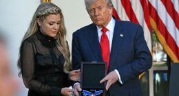 US President Donald Trump and Erika Kirk (L), Charlie Kirk's widow, participate in a Medal of Freedom Ceremony for late US right-wing activist Charlie Kirk in the Rose Garden