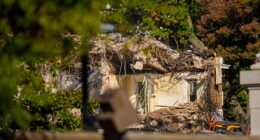 The facade of the East Wing of the White House is demolished by work crews on Wednesday