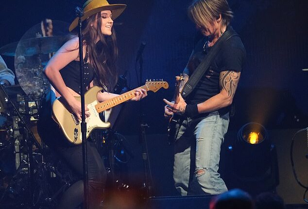 Maggie Baugh, 25, has been thrust into the spotlight as reports surface that Keith Urban, 57, has already moved on 'with a younger woman in the [music] business,' one source told the Daily Mail