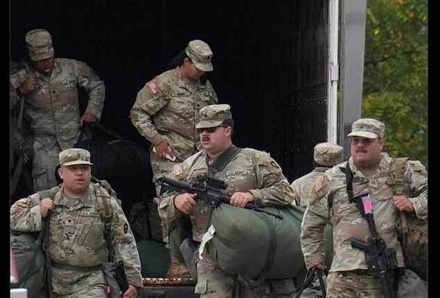 On October 7, a picture taken by the AP showing Texas National Guard troops arriving outside of Chicago, Illinois, went viral