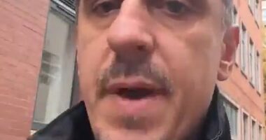 Gary Neville (above) is facing a furious backlash from builders at his £400million construction site after he ordered them to take down a Union flag