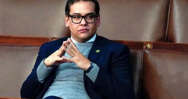 Then-Rep. George Santos, R-N.Y., waits for the start of a session in the House chamber in Washington, Jan. 6, 2023, just after being sworn in. He was later expelled after allegations of fraud were revealed - infractions which later led to his arrest and seven-year prison sentence