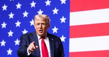 U.S. President Donald Trump gestures after speaking during a meeting of senior military leaders convened by U.S. Defense Secretary Pete Hegseth, at Marine Corps Base Quantico in Quantico, Virginia, U.S., September 30