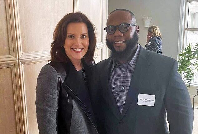 Leon El-Alamin (pictured right with Whitmer, left) faces charges of domestic battery and assault for allegedly beating his girlfriend